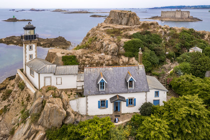 France, Finistère, Morlaix bay, Carantec, Louet Island and its lighthouse, the Taureau castle built by Vauban in the background (aerial view)
