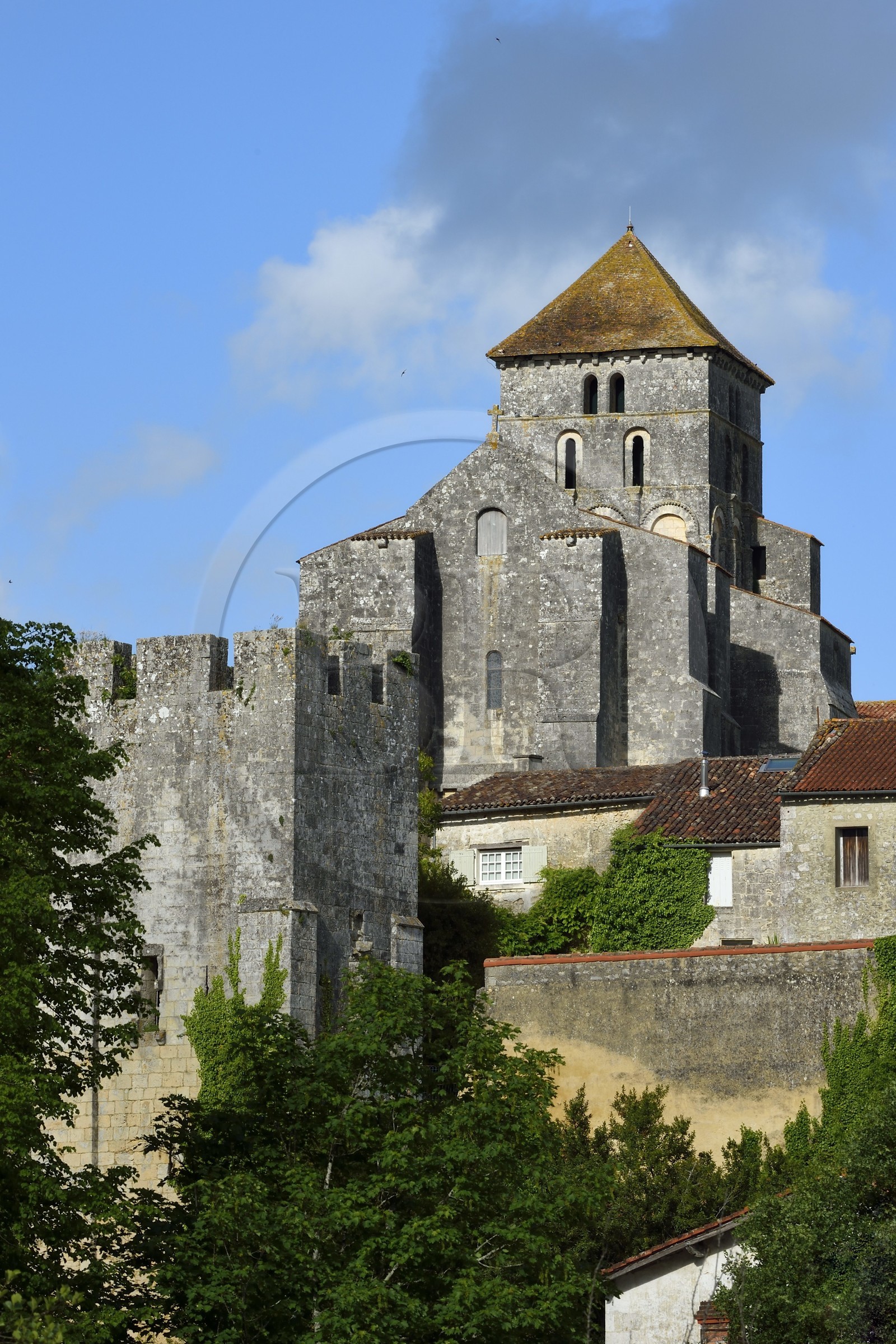 France, Charente-Maritime, Saint-Sauvant, the medieval tower and the Saint Sylvain church overlooks the Coran valley