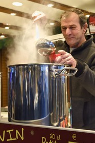 France, Bas Rhin, Strasbourg, old town listed as World Heritage by UNESCO, Christmas market (Christkindelsmarik) on the place Broglie, hot spiced wine stand