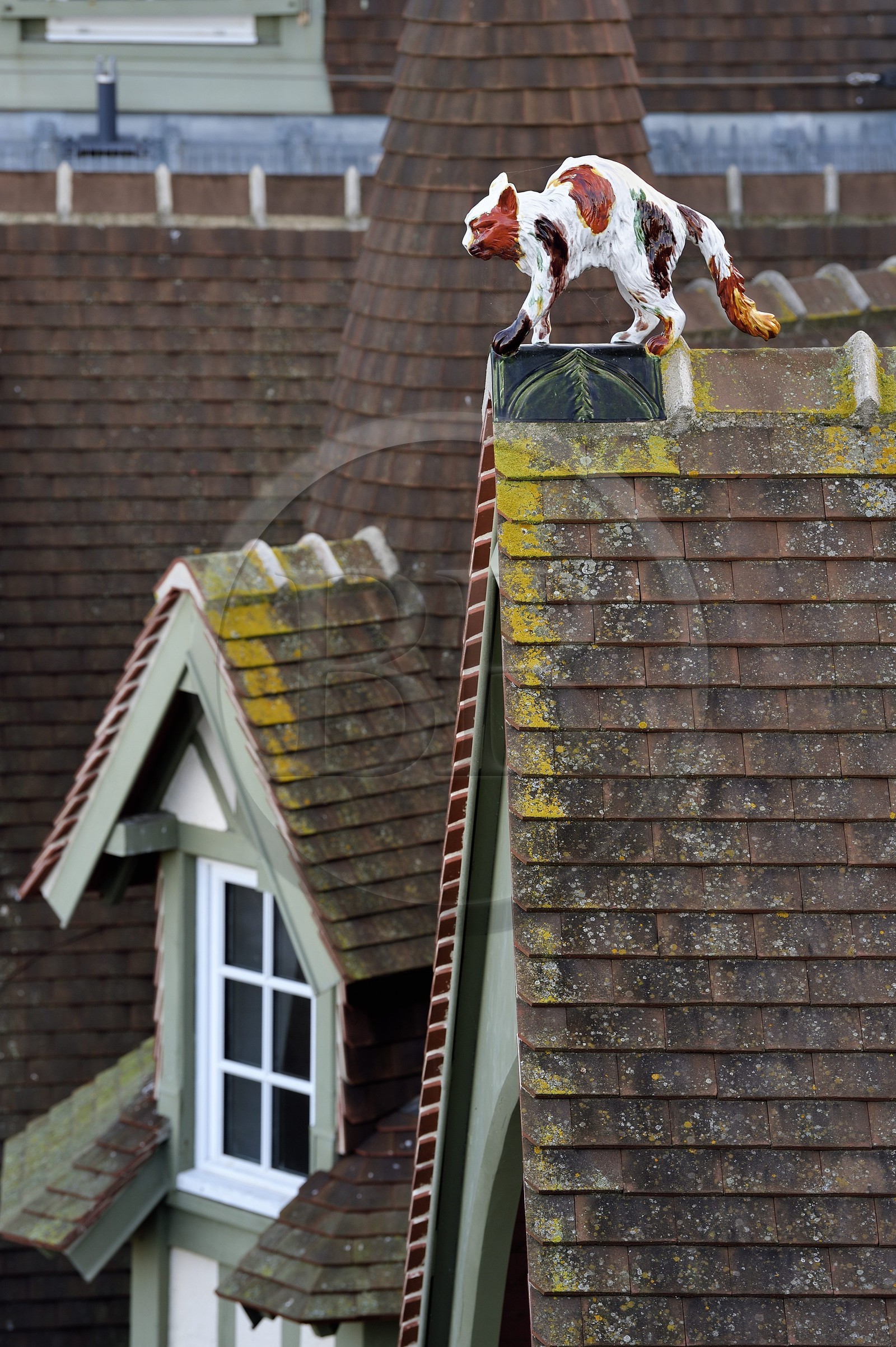 France, Calvados, Pays d'Auge, Deauville, Normandy Barriere Hotel, finial (hip-knob) representing a cat, typical on the rooftops of the Pays d'Auge