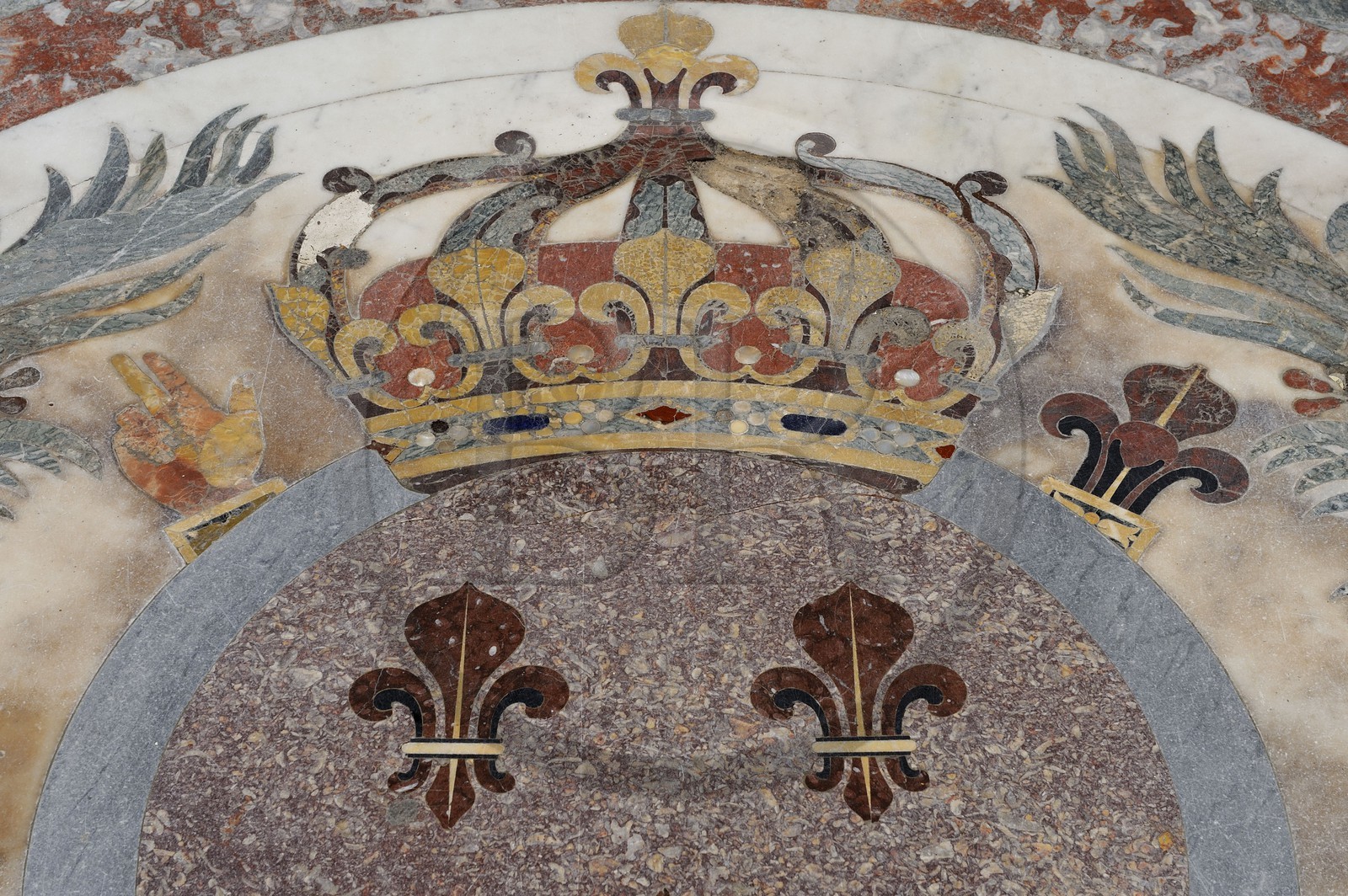 France, Yvelines, Chateau de Versailles, listed as World Heritage by UNESCO, the Royal Chapel, detail of the marble floor, crown and fleur de lys (lily flower symbol of the king)