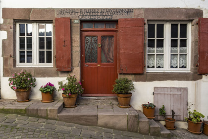 France, Pyrenees Atlantiques, Basque Country, Saint Jean Pied de Port, rue de la Citadelle on the Way of St. James, lintel of house Johan Biriberry and Louise Duhalde master and mistress of the house of Londresena 1722