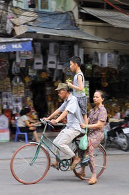 Vietnam, Hanoi, 36 streets district in the old town, family on a bicycle