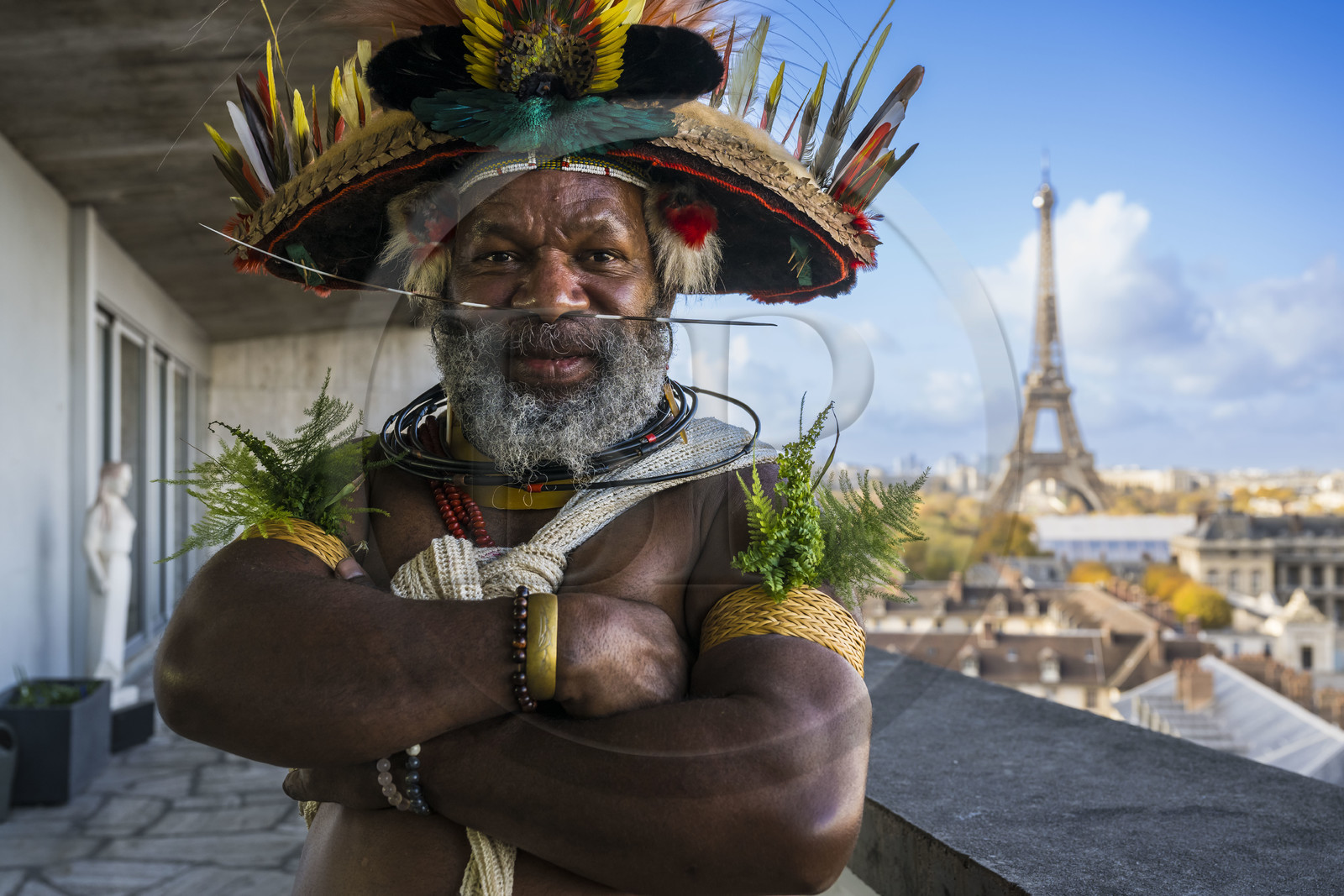 France, Paris, UNESCO Headquarters, Papuan Chief Mundiya Kepanga and the Eiffel Tower in the background