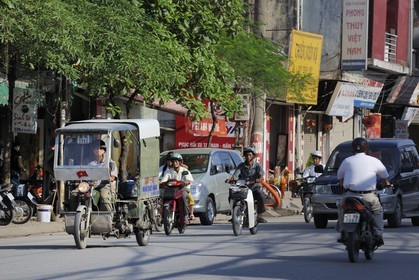 Vietnam, Hanoi, motorcycle traffic in the old city