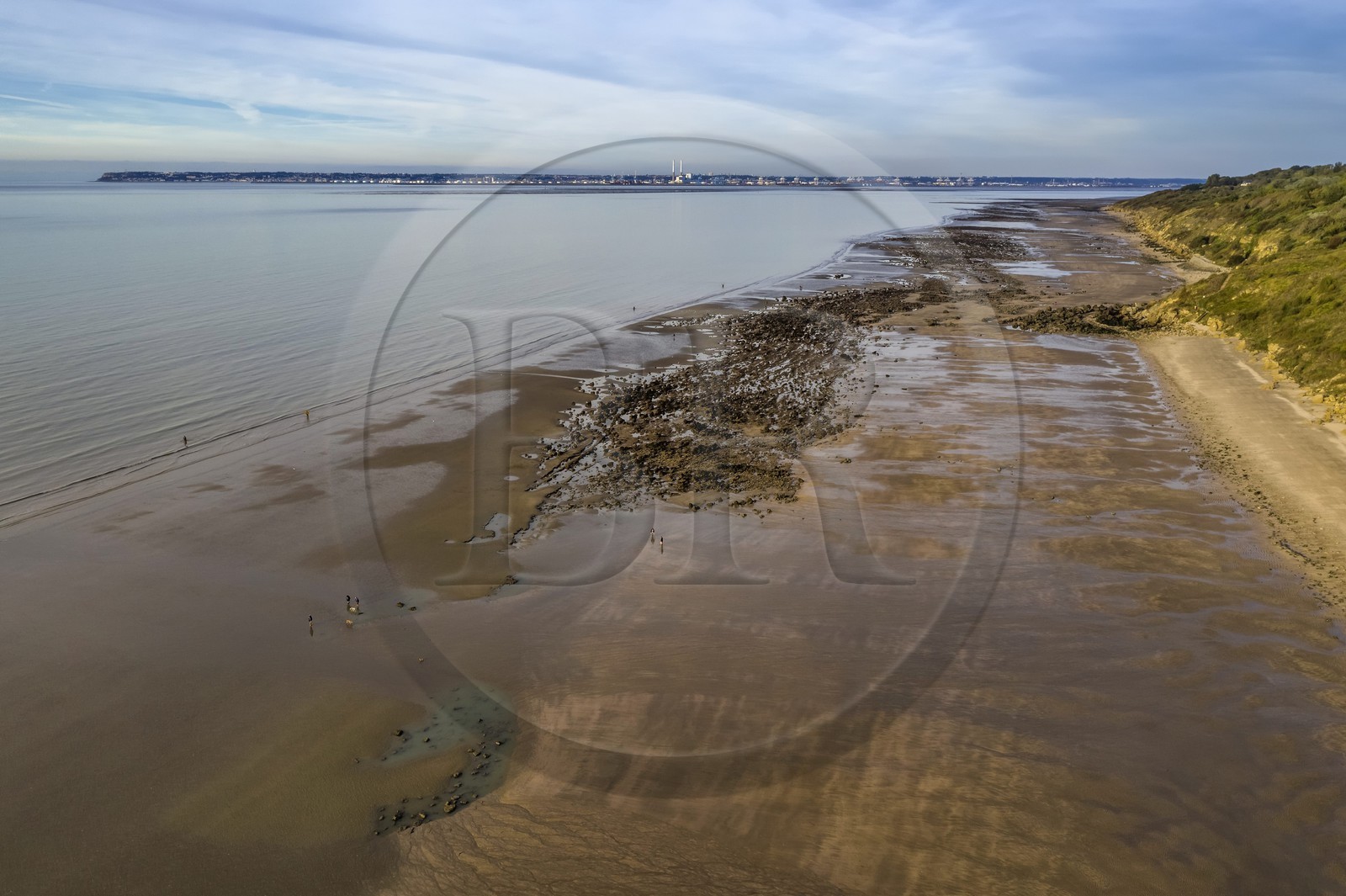 France, Calvados, Pays d'Auge, Trouville sur Mer, the Roches Noires (Black Rocks) beach which extends for several kilometers towards Hennequeville and Villerville, bordered by the cliffs of Roches Noires, Le Havre in the background (aerial view)
