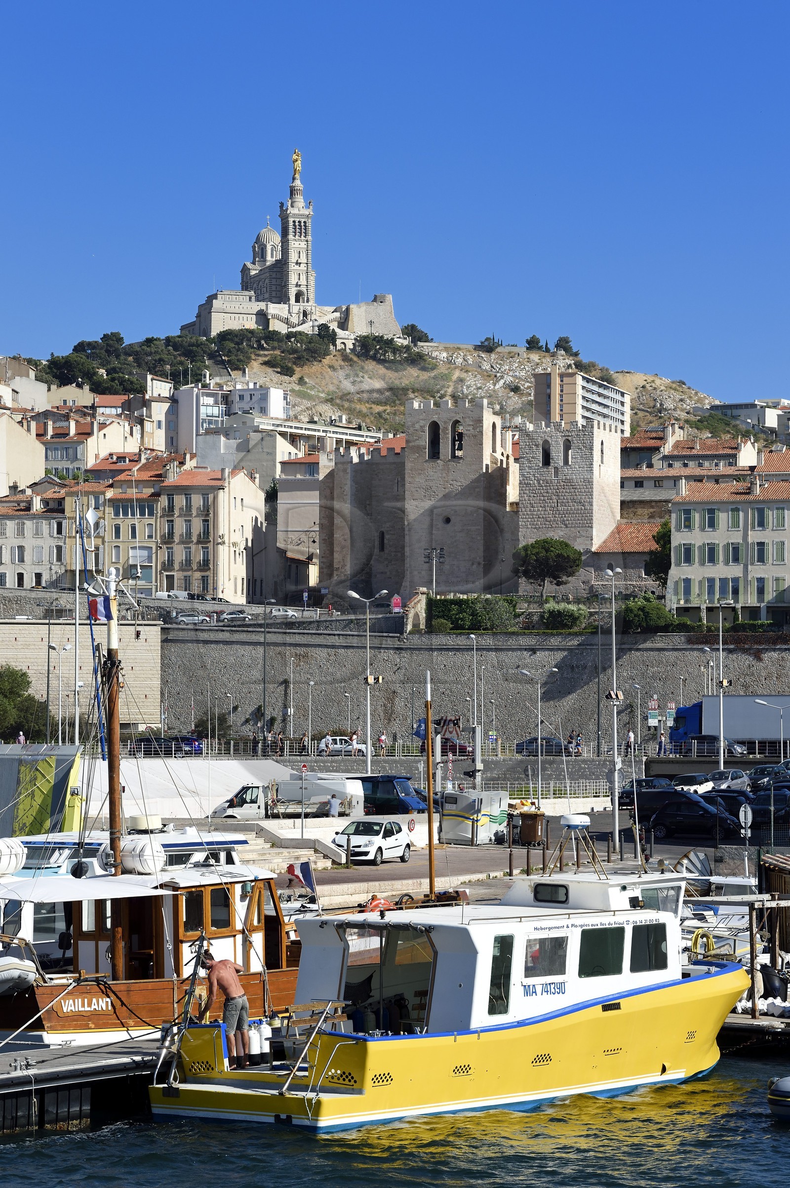 France, Bouches du Rhone, Marseille, the Vieux Port, Saint Victor abbey and Notre Dame de la Garde in the background