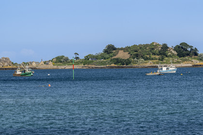 France, Cotes d'Armor, Ploubazlanec, the Island of Saint-Riom and fishing boats at anchor at Porz Even