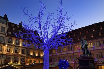 France, Bas Rhin, Strasbourg, Gutenberg Square, statue of Gutenberg and chamber of commerce, Christmas lights, tree lit with LEDs