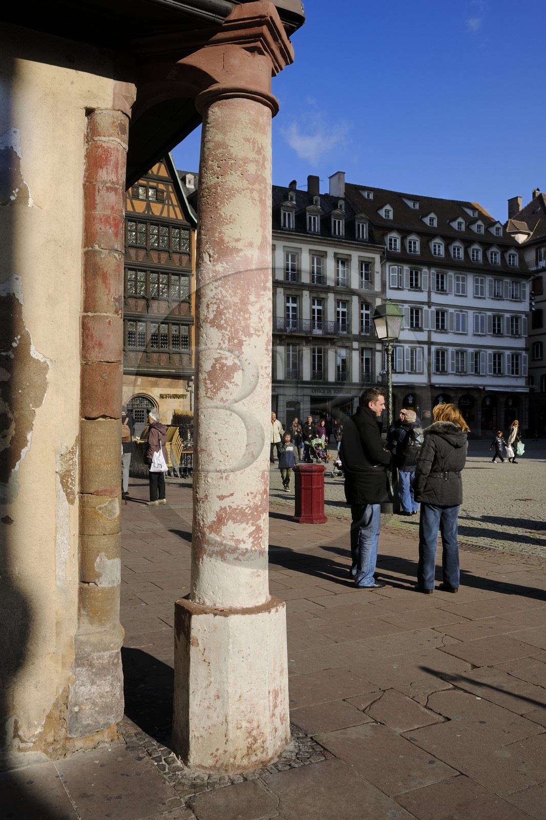 France, Bas Rhin, Strasbourg, old town listed as World Heritage by UNESCO, angle of rue Merciere and place de la Cathedrale, the column Meter belly dating from the middle age