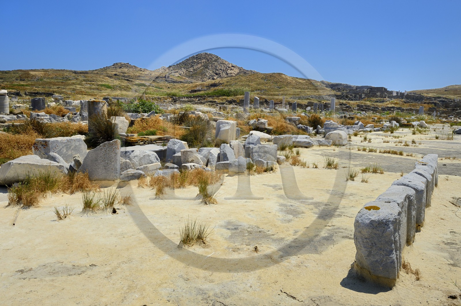 Greece, Cyclades islands, Delos, listed as World Heritage by UNESCO, the archaeological site of Delos, Apollo's Sanctuary, the most ancient city of the Aegean Sea, remains of the port area