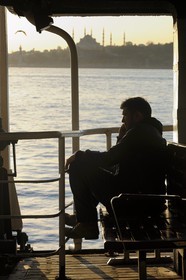 Turkey, Istanbul, ferry crossing the Bosphorus Strait, Camii Sultan Ahmet (Blue Mosque) in the background