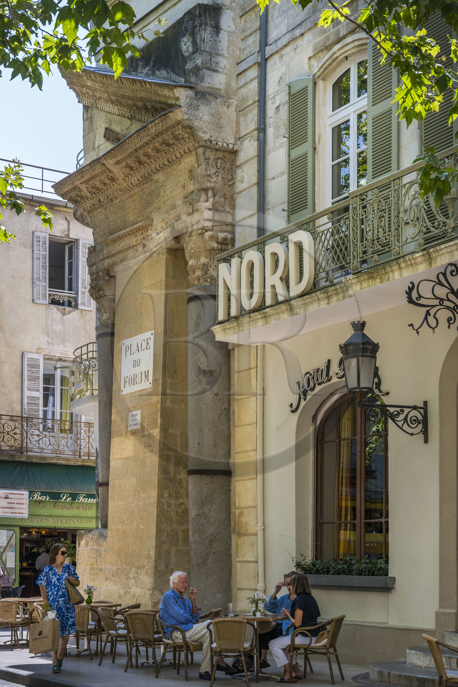 France, Bouches du Rhone, Arles, columns of Saint Lucian, half-pediment and two Corinthian capitals, the only remains of a small temple (2nd century) of the ancient Roman forum on the current place du Forum, listed as World heritage by UNESCO