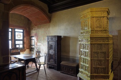France, Bas Rhin, Orschwiller, Alsace Wine Road, Haut Koenigsbourg Castle, the yellow ceramic stove (kachelofe) is made of tiles copying stove tiles found during excavations