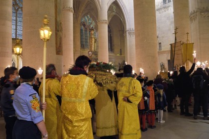 France, Meurthe-et-Moselle, Saint Nicolas de Port, Basilica of Saint Nicolas, torchlight procession which has been celebrated since 1245 on the occasion of Saint Nicholas, the relic of Saint Nicolas blessing dexter (according to tradition it is the bones of a joint of the right hand of the bishop) that is kept in a reliquary arm of the late 19th century in silver, gold, enamel and diamonds