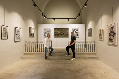 France, Vaucluse, Dentelles de Montmirail mountains, the medieval village of Séguret, labelled Les Plus Beaux Villages de France (The Most Beautiful Villages of France), painters Jacky Bretaudeau on the left and Olivier J.L.W. on the right exhibit their works in the former Saint-Thècle chapel