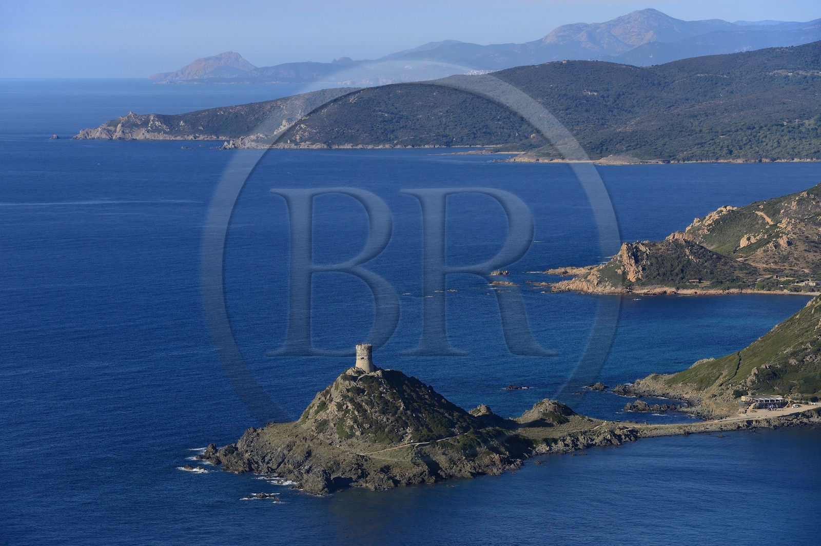 France, Corse du Sud, Golfe d'Ajaccio, Pointe de la Parata and Tour de la Parata facing the Sanguinaires islands, the west coast towards the Gulf of Porto in background (aerial view)