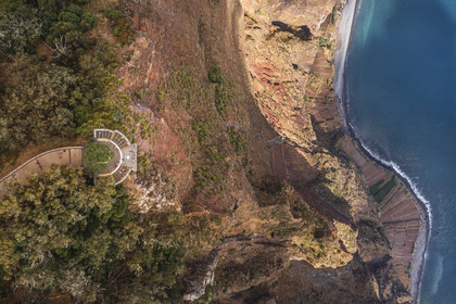 Portugal, Madeira Island, Camara de Lobos, the Cap Girao belvedere, a glass platform overlooking the second highest cliff in the world at 589 meters high, cultivated fields at the foot of the cliff (aerial view)