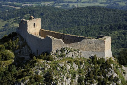 France, Ariege, Pays d' Olmes, Cathar Castle of Montsegur perched on a rock and the Pyrenees (aerial view)..