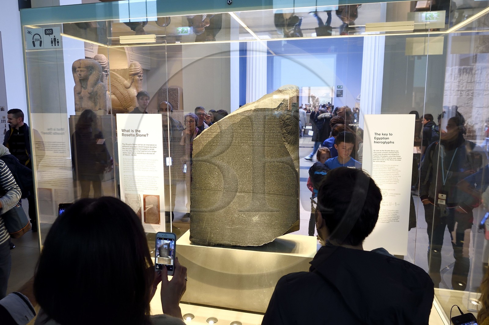 United Kingdom, London, Bloomsbury area, the British Museum, Ancient Egypt, the Rosetta Stone, engraved stela fragment of ancient Egypt bearing three versions (hieroglyphs, Egyptian demotic and Greek alphabet) of the same text that allowed the deciphering of hieroglyphs in the 19th century by Jean-François Champollion