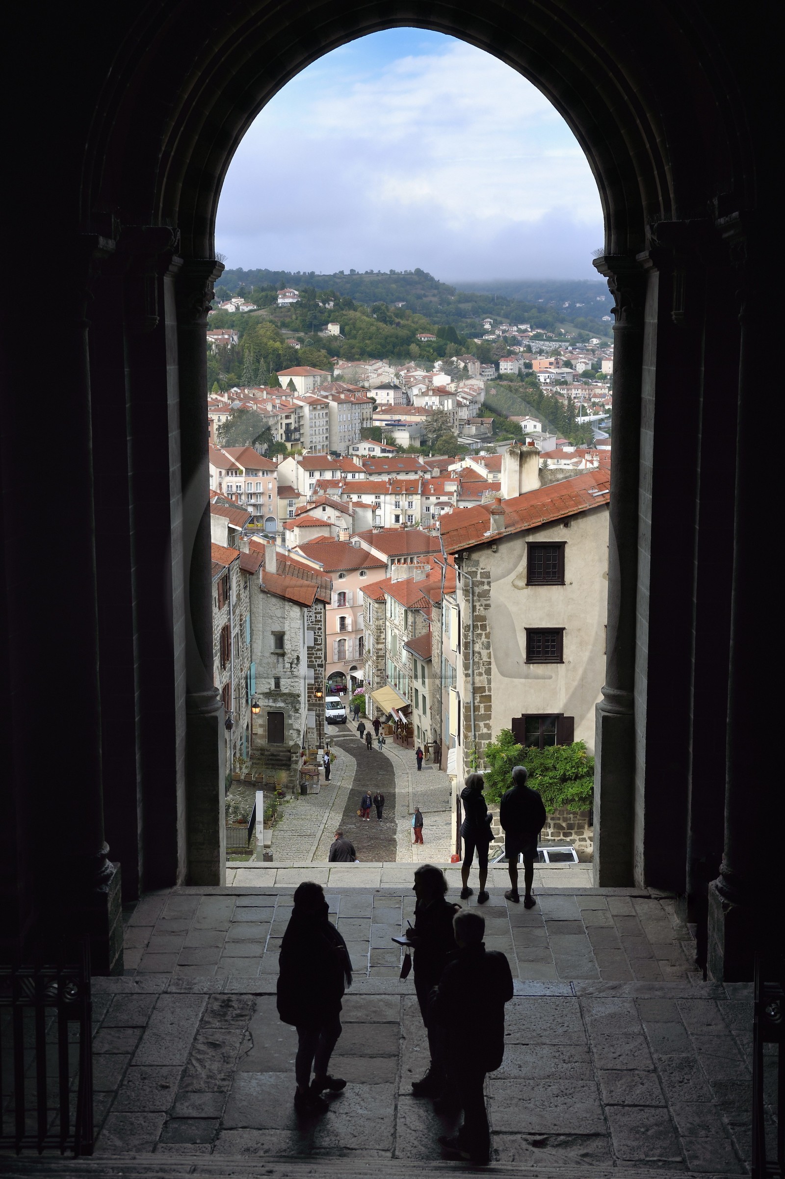 France, Haute Loire, Le Puy en Velay, Routes of Santiago de Compostela, porch of the 12th century Our Lady (Notre-Dame-de-l'Annunciation) cathedral listed as World heritage by UNESCO and the rue des Tables