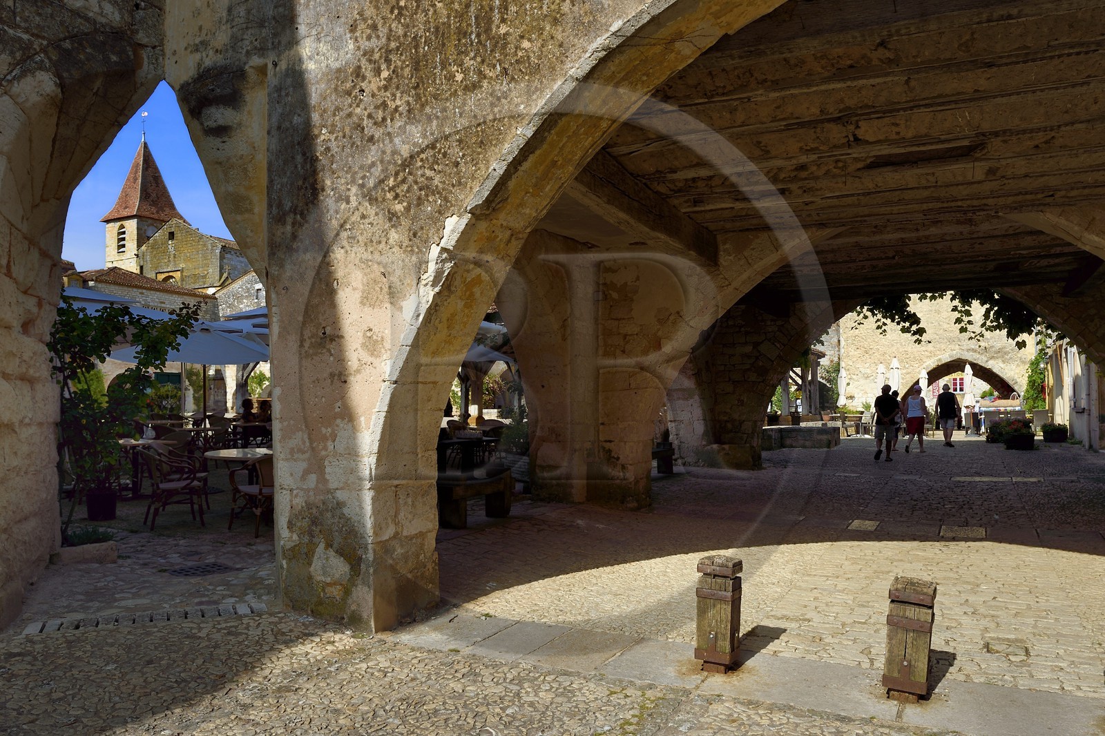 France, Dordogne, Perigord Pourpre, Monpazier, labelled Les Plus Beaux Villages de France (The Most Beautiful Villages in France), western facade of St. Dominic church view from a corner of the place des Cornieres in the heart of the village