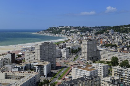 France, Seine Maritime, Le Havre, Downtown rebuilt by Auguste Perret listed as World Heritage by UNESCO, Perret buildings of Porte Océane (Ocean Gate) at the end of the Avenue Foch and Sainte-Adresse in the background