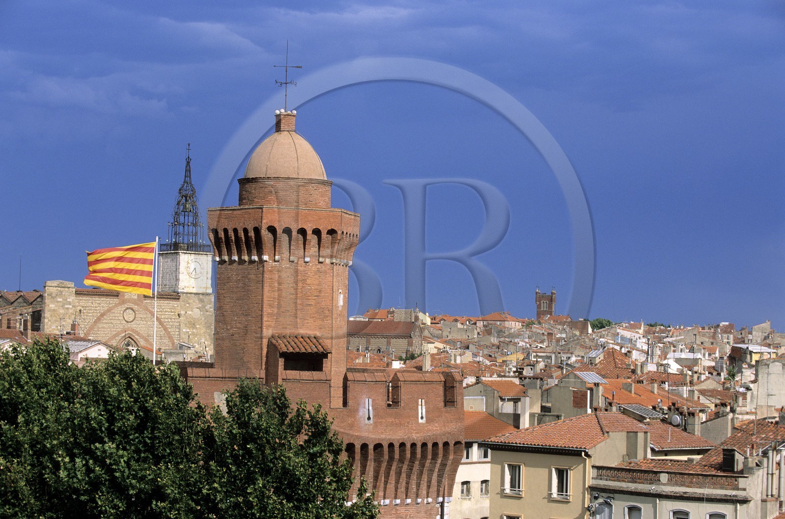 France, Pyrenees Orientales, Perpignan, old town and the Castillet with the catalan flag, part of the old walls