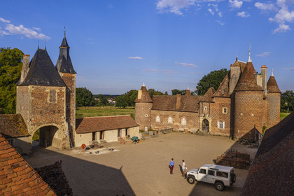 France, Allier (03), former province of Bourbonnais, Chapeau, Chateau de la Cour (15th century to late 16th century), with a decor of black brick herringbone on a background of red bricks (aerial view)