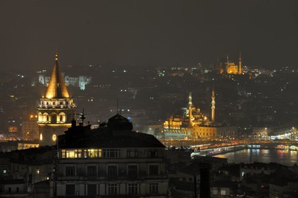 Turkey, Istanbul, historical center listed as a UNESCO World Heritage, Galata Tower, Galata Bridge over the Straits of the Golden Horn Yeni Cami adjacent (New Mosque) and Nuruosmaniye Mosque in the background