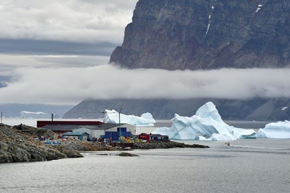 Greenland, west coast, Baffin bay, the town of Uummannaq clinging to the rock, the port