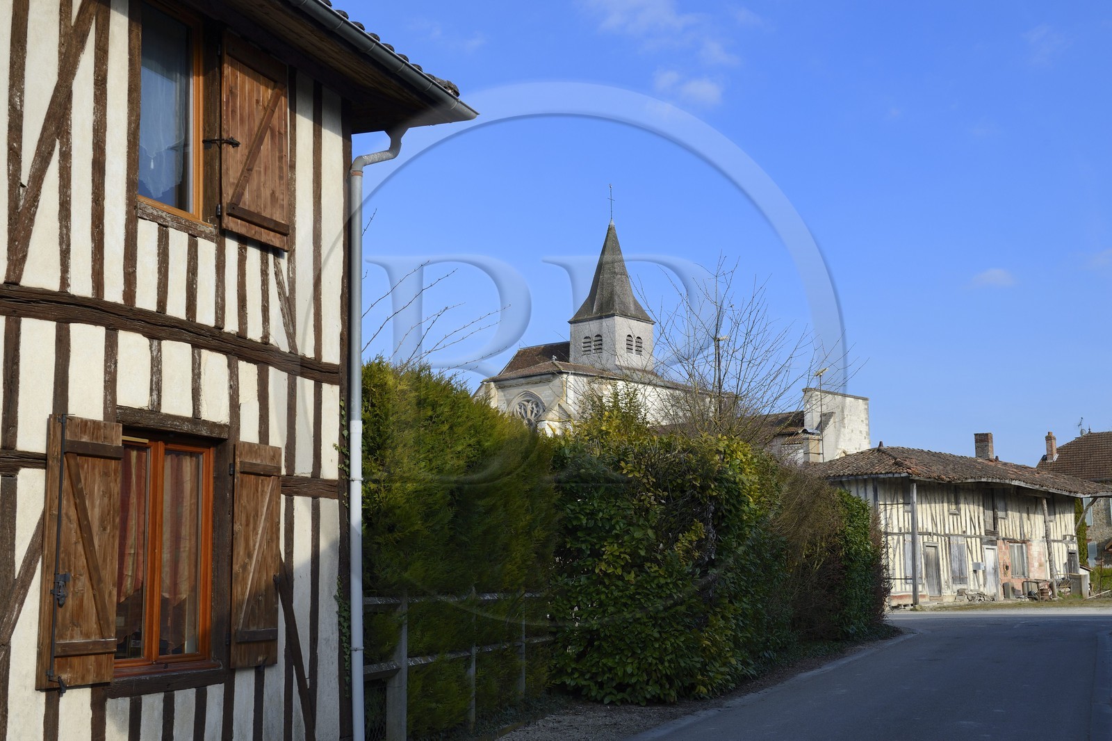France, Marne, village of Saint-Amand-sur-Fion,  half timbered farm and the church in the background