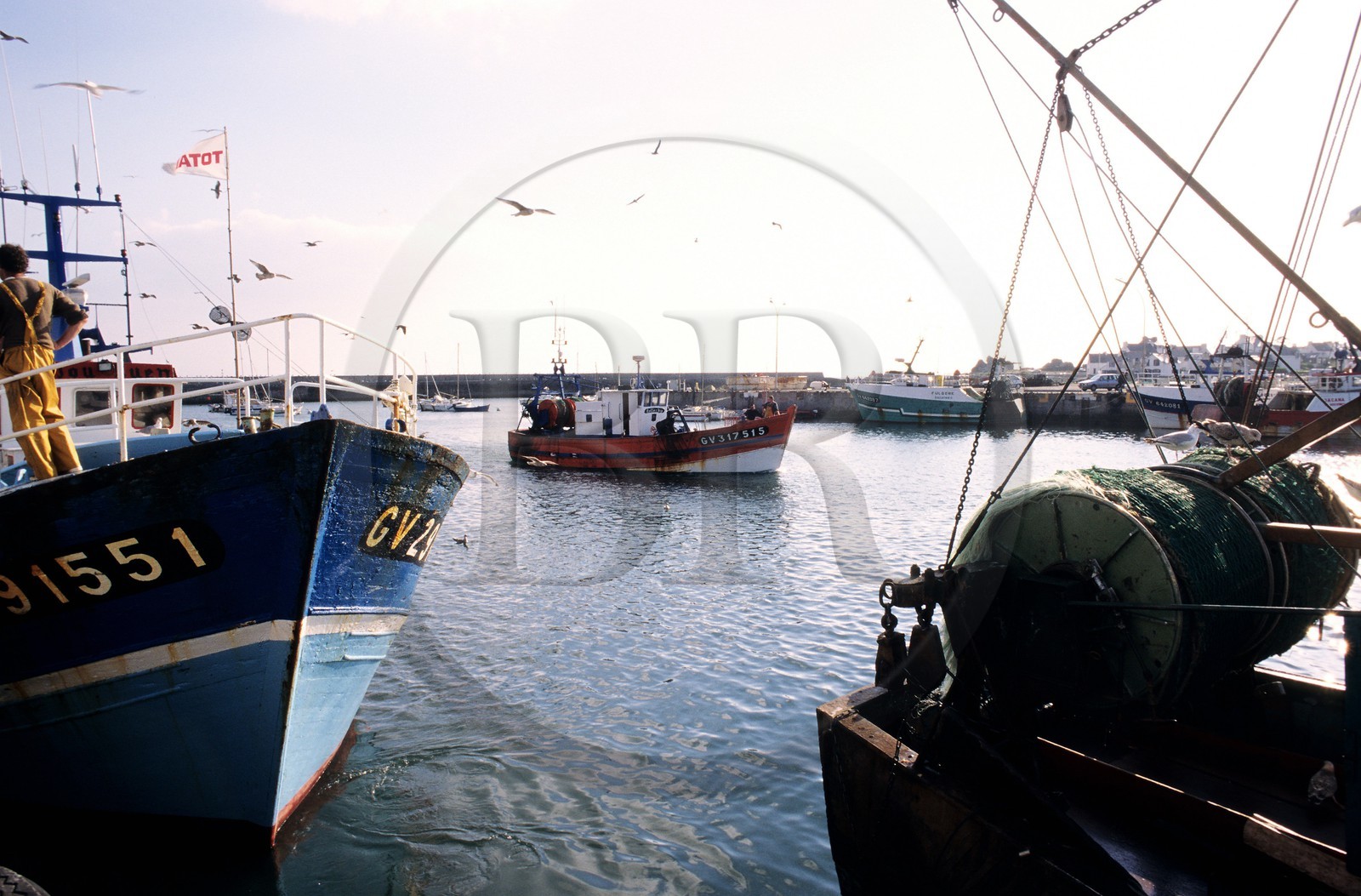 France, Finistere, Lesconil, trawler returning from fishing