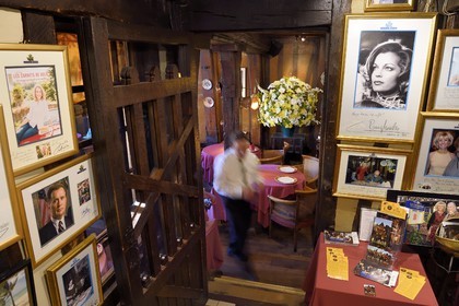 France, Seine Maritime, Rouen, place du Vieux Marché, the restaurant La Couronne in a half-timbered house from 1345 is the said to be the oldest inn in France, portrait of famous customers hanging on the walls