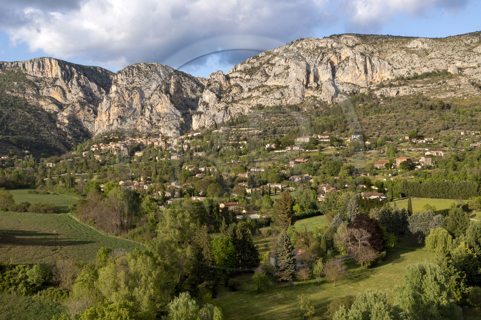 France, Alpes de Haute Provence, Parc Naturel Régional du Verdon, village of Moustiers Sainte Marie, labelled Les Plus Beaux Villages de France (The Most Beautiful Villages of France) (aerial view)