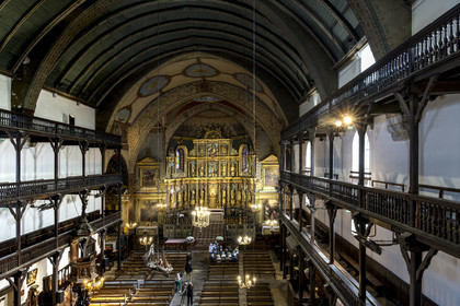 France, Pyrenees Atlantiques, Basque Country, Saint Jean de Luz, the Saint-Jean-Baptiste (Saint John the Baptist) Church, 17th century altarpiece in gilded wood and the wooden galleries of the nave