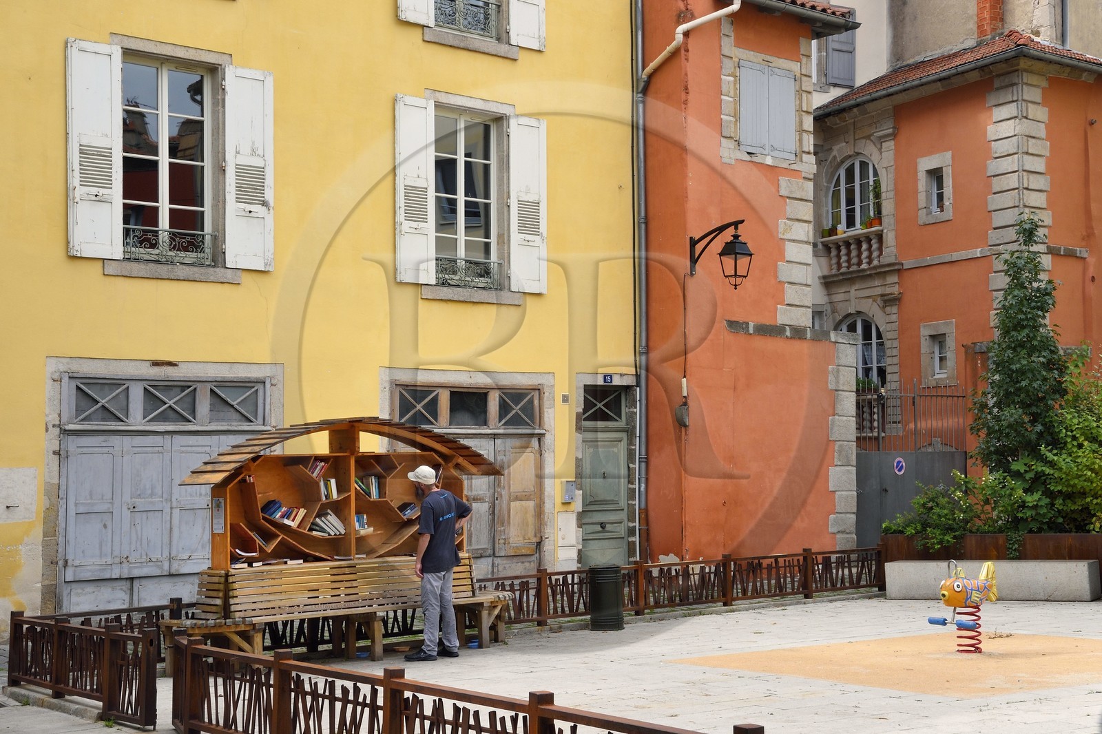 France, Haute Loire, Le Puy en Velay, Routes of Santiago de Compostela in France listed as World heritage by UNESCO, Lower town, Place Bernard Jammes, Library bench, book box where everyone can freely put, borrow or take a book