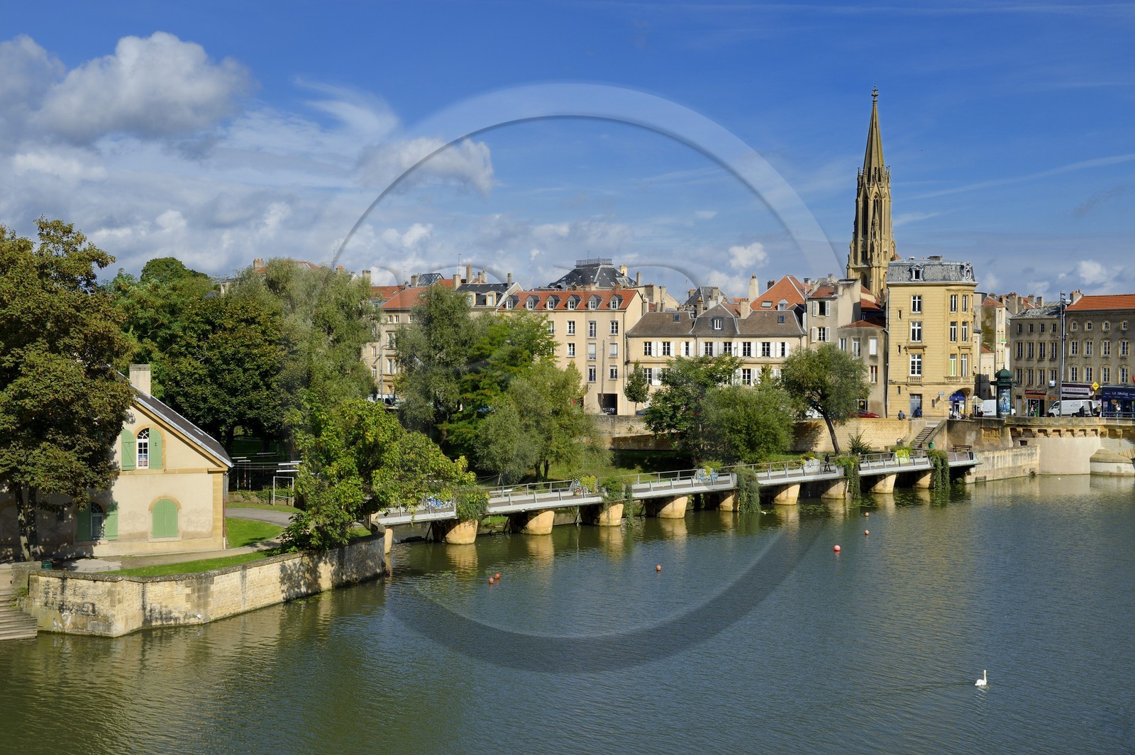 France, Moselle, Metz, the Islands and the canalized River Moselle banks, the tower of the Garrison temple in the background