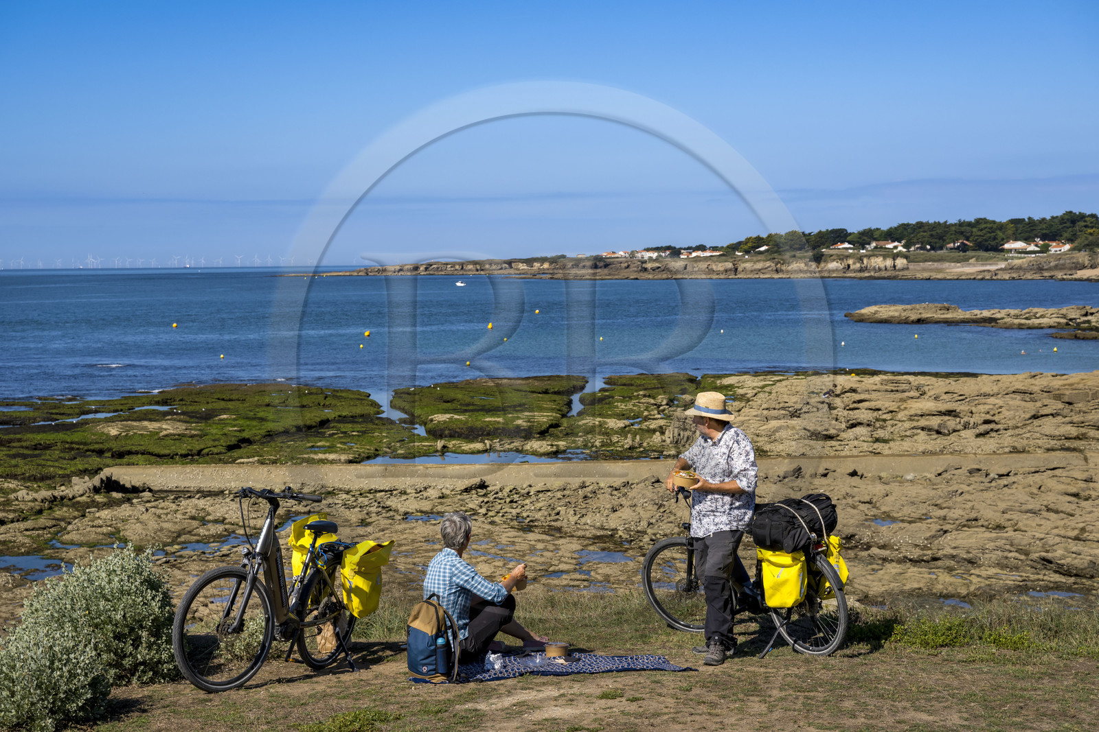 France, Loire Atlantique, Préfailles, picnic along the Vélodyssée cycle route along the ocean and Pointe Saint Gildas in the background