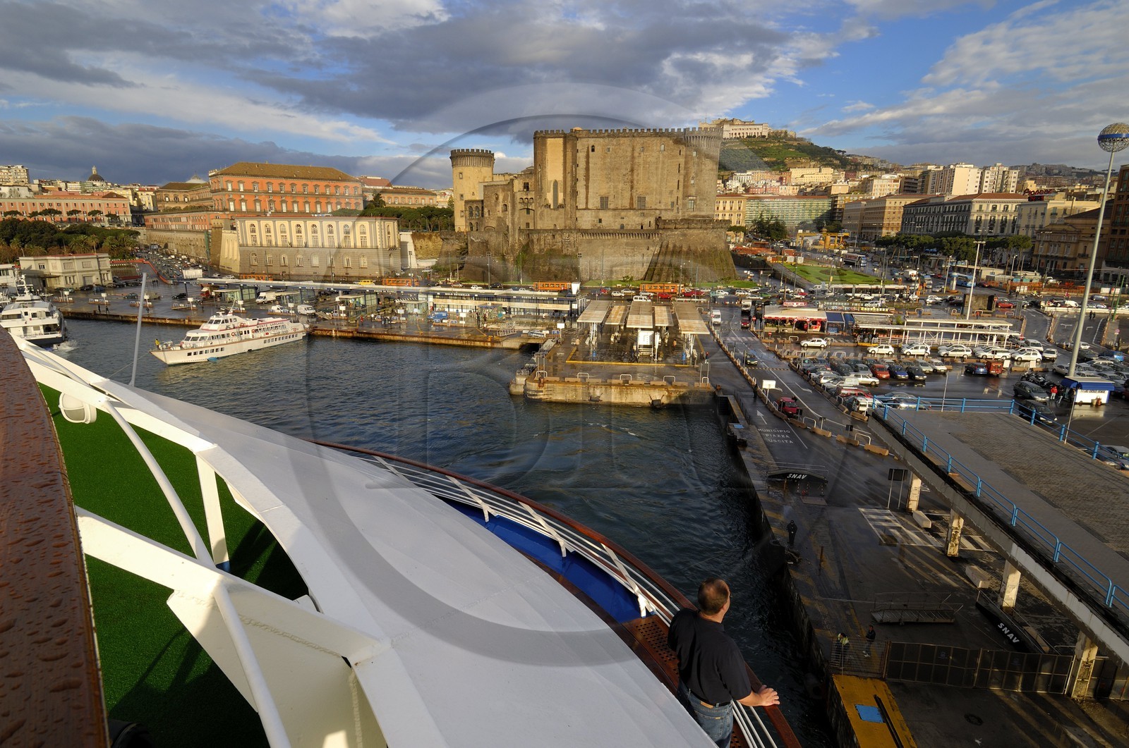 Italy, Campania, Naples, Historic center listed as World Heritage by UNESCO, Castel San Elmo on up side to Naples Hill, Palazzo Reale left, the Castel Nuovo in the center and the passenger port on the right