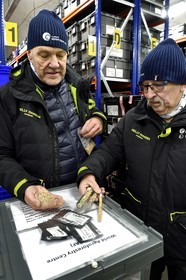 Norway, Svalbard, Spitzbergen, Longyearbyen, Svalbard Global Seed Vault (Seed Bank), seed storage room artificially maintained at -18°C, there are nearly 900000 samples deposited, from 200 countries of origin and 73 depositor institutes, Åsmund Asdal from NordGen holds wheat in his hand and Roland von Bothmer (on the right) presents the new means of storing seeds in vacuum aluminum bags and old ones in glass tubes
