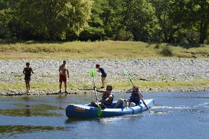 France, Ardeche, Balazuc, kayaks going down the Ardeche River between Balazuc and Pradons