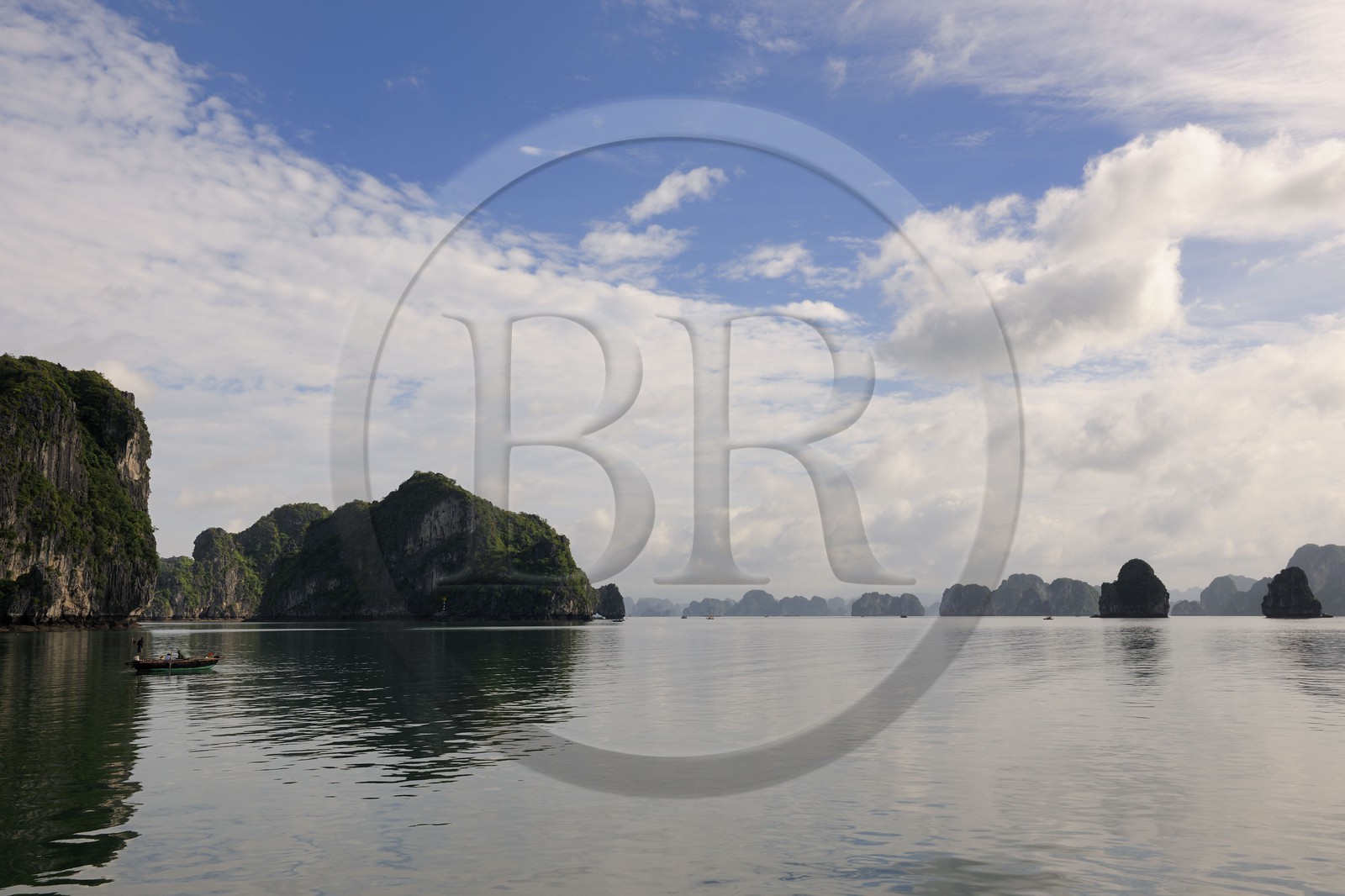 Vietnam, Quang Ninh Province, Halong Bay, listed as World Heritage by UNESCO, fishing boat