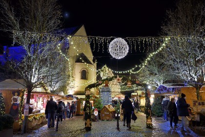 France, Haut Rhin, Eguisheim, labelized Les Plus Beaux Villages de France (the Most Beautiful Villages of France), stalls Christmas lights and decorations on the Place du Chateau Saint-Leon