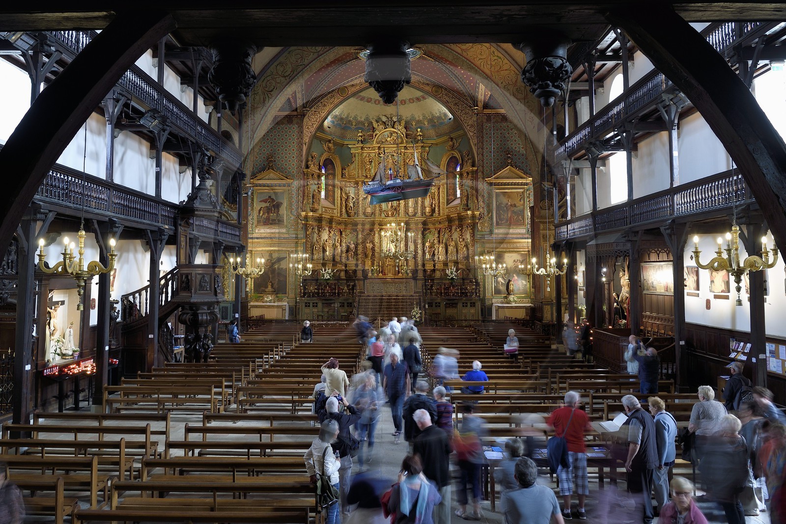 France, Pyrenees Atlantiques, Basque Country, Saint Jean de Luz, the Saint-Jean-Baptiste (Saint John the Baptist) Church, 17th century altarpiece in gilded wood and the wooden galleries of the nave