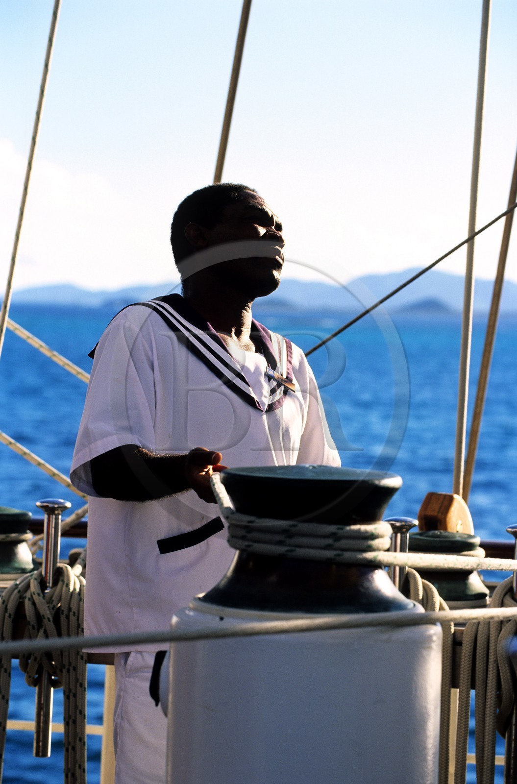 Caribbean sea, the five masted ship SPV Royal Clipper, sailor working on the deck