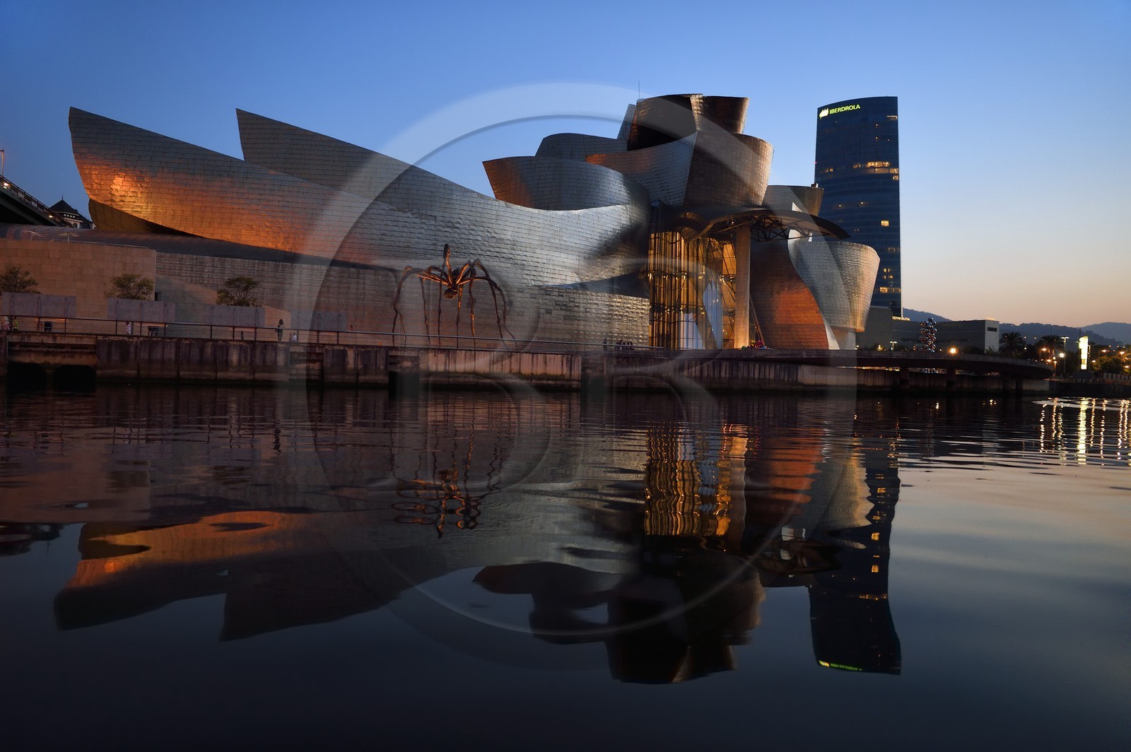 Spain, Basque Country, Biscay Province, Bilbao, the Guggenheim Museum designed by Frank Gehry and the Iberdrola Tower
