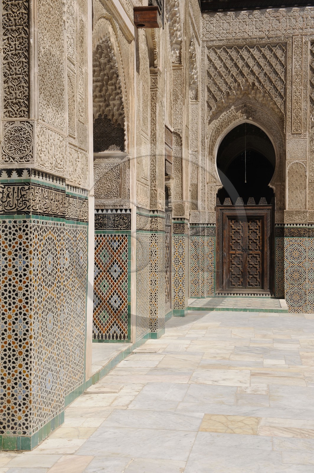 Morocco, Middle Atlas, Fez, Imperial City, Fez El Bali, medina listed as World Heritage by UNESCO, Bouananiya (or Bou Inania) Merdersa, fine-cut facade and zelliges