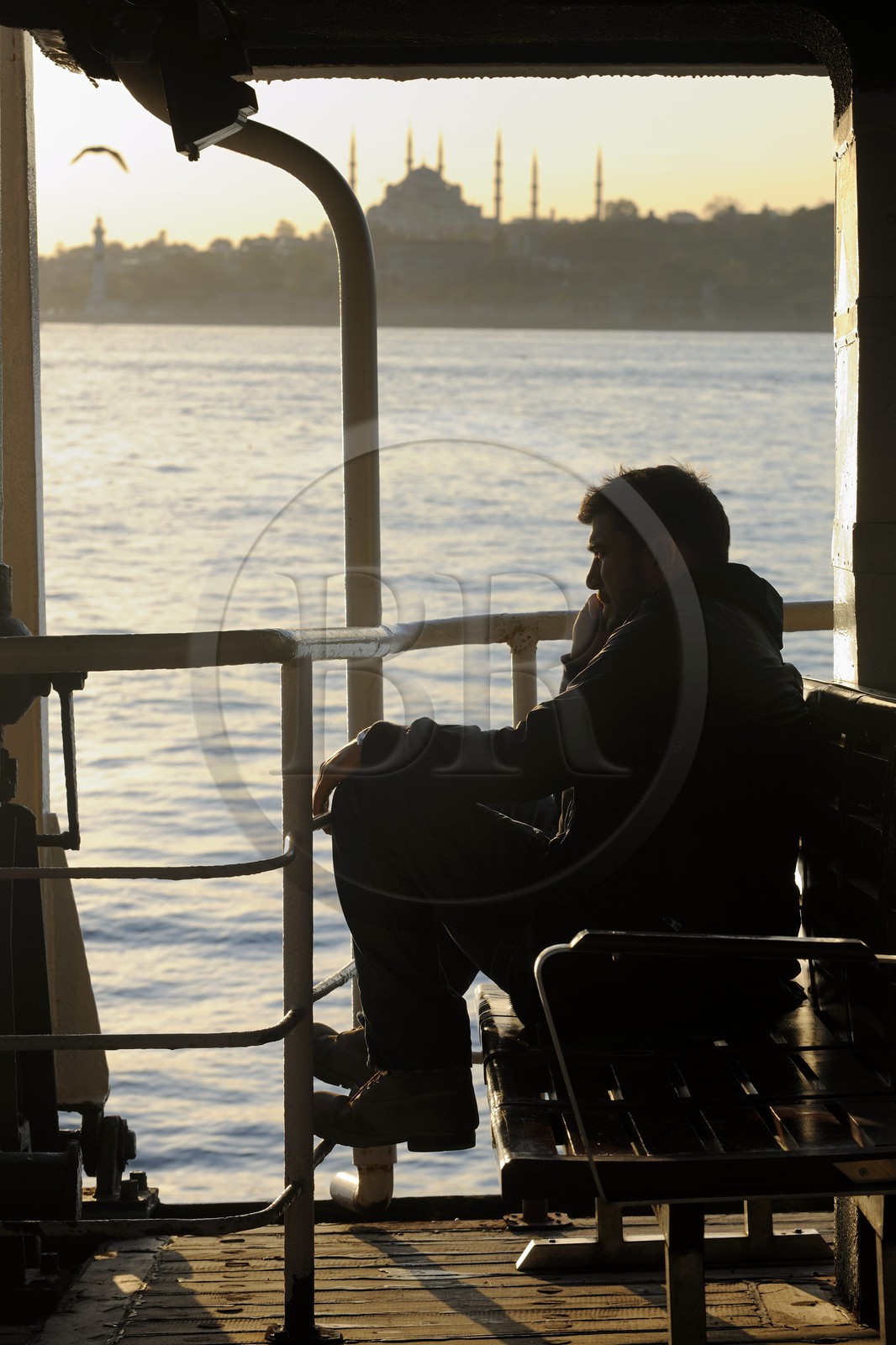 Turkey, Istanbul, ferry crossing the Bosphorus Strait, Camii Sultan Ahmet (Blue Mosque) in the background