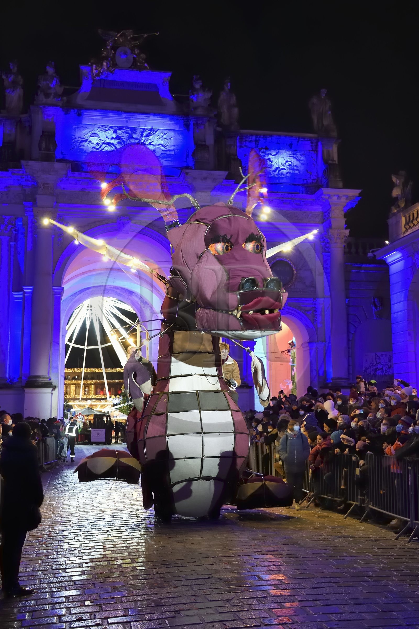 France, Meurthe-et-Moselle, Nancy, place Stanislas, the parade of Saint-Nicolas, Josephine the dragon, wild transport of the Four Seasons Company in front of the Arc de Triomphe (Porte Héré)